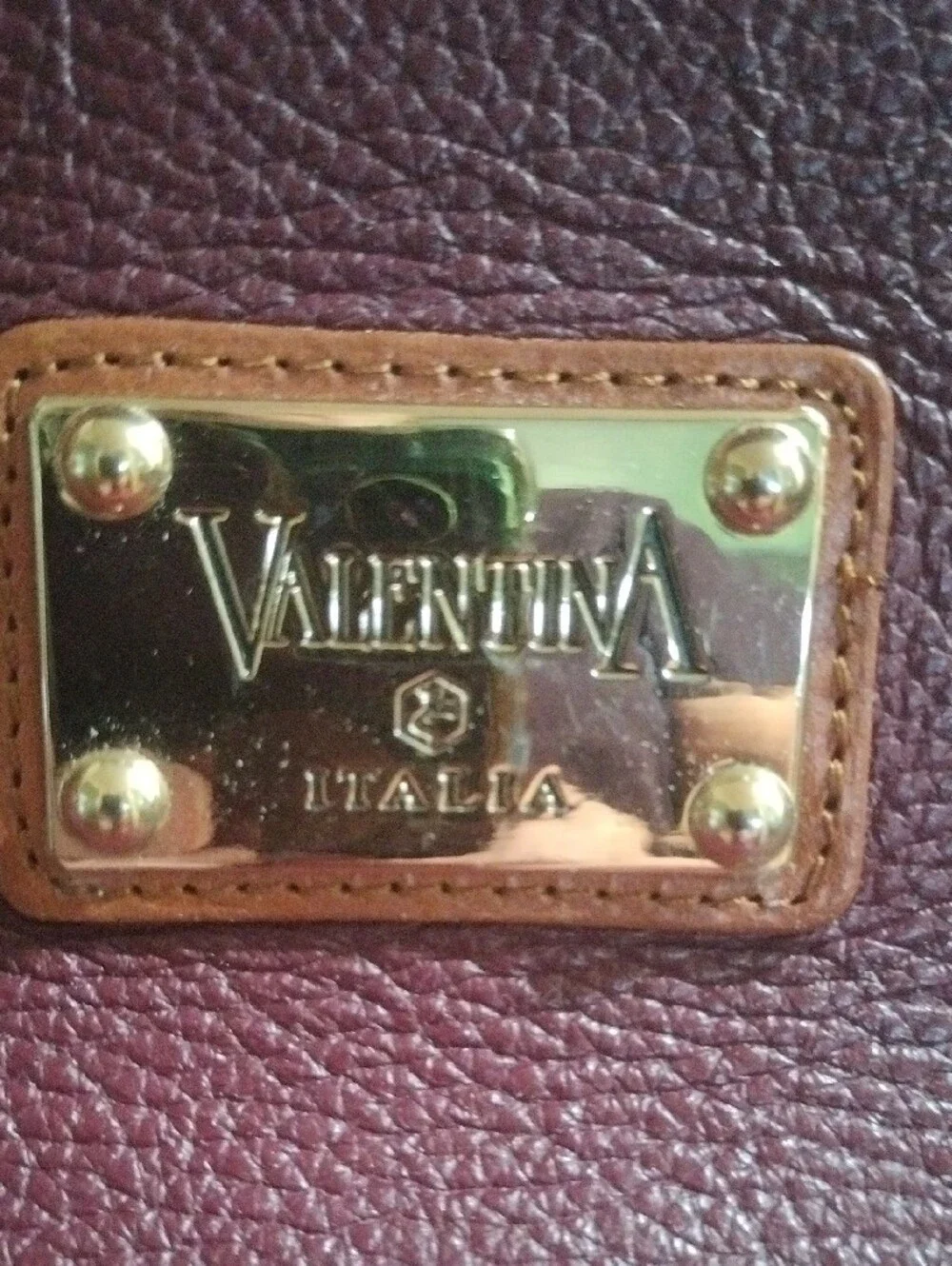 Valentina Italia plum pebbled